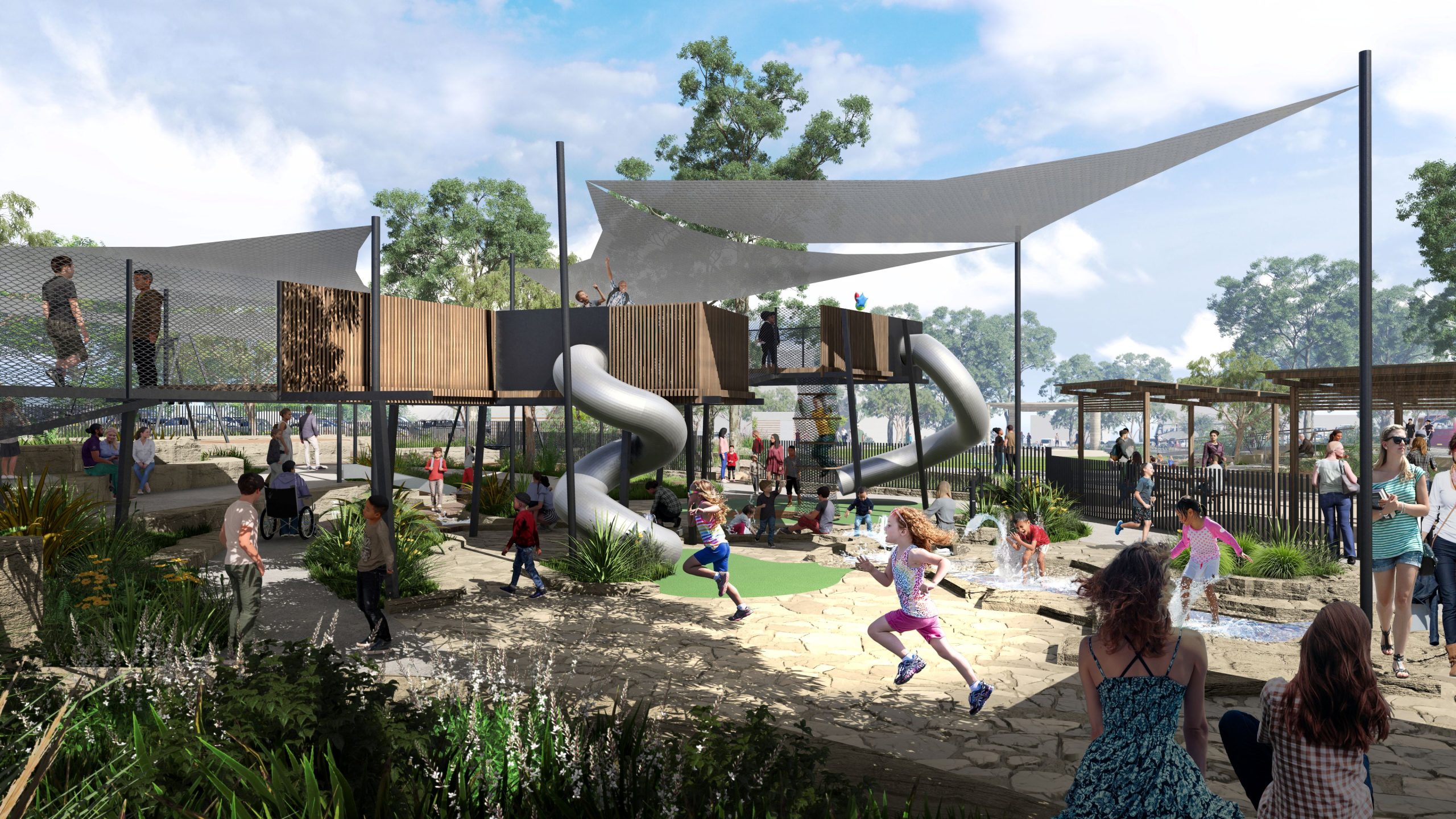 St-Marys-Central-Park-Project_Artist-render-of-fenced-playspace-with-a-variety-of-equipment-water-play-shade-and-shaded-picnic-tables-scaled-1